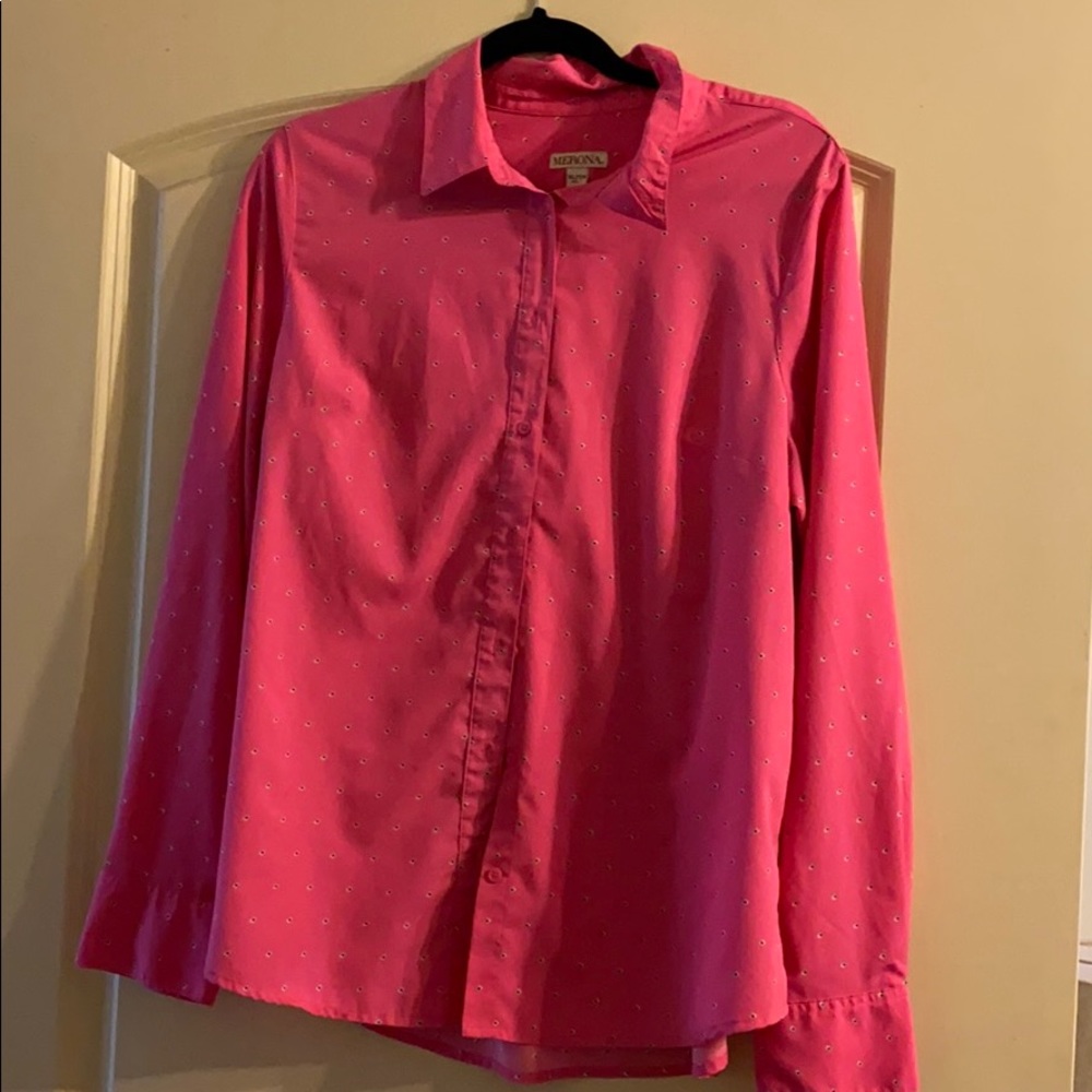 Long sleeved button-down top.